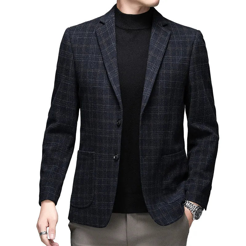Man wearing a solid colour loose-fit suit-style winter jacket.