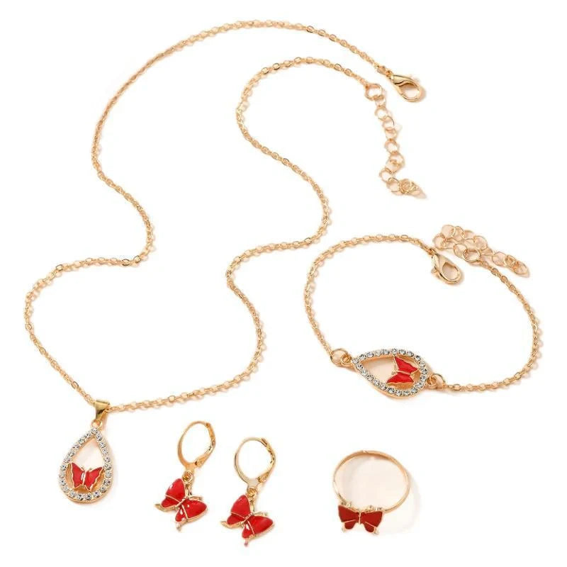 Women's 4PCS Butterfly Jewelry Set with diamond accents in red, pink, white, and black