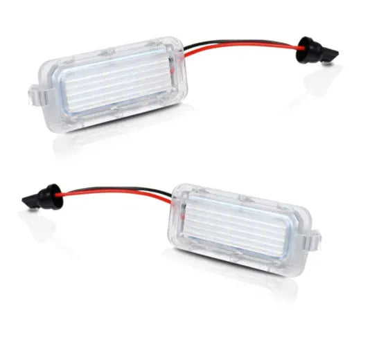 White 12V license plate lamp pair for Ford Focus Fiesta Mondeo with 6500K output and PC body