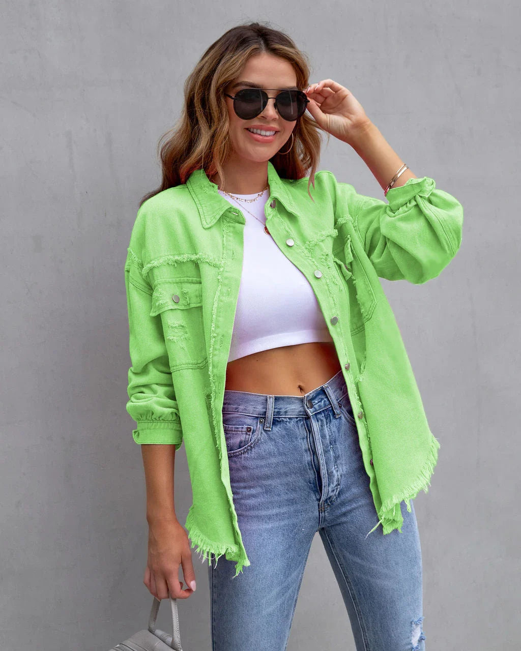Stylish ripped denim jacket for trendy women in a variety of vibrant colors