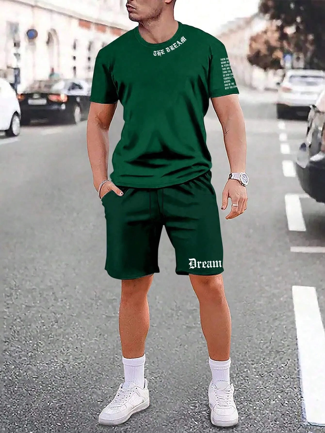 Man wearing a printed short-sleeve sports top and matching shorts in a quick-dry polyester blend.
