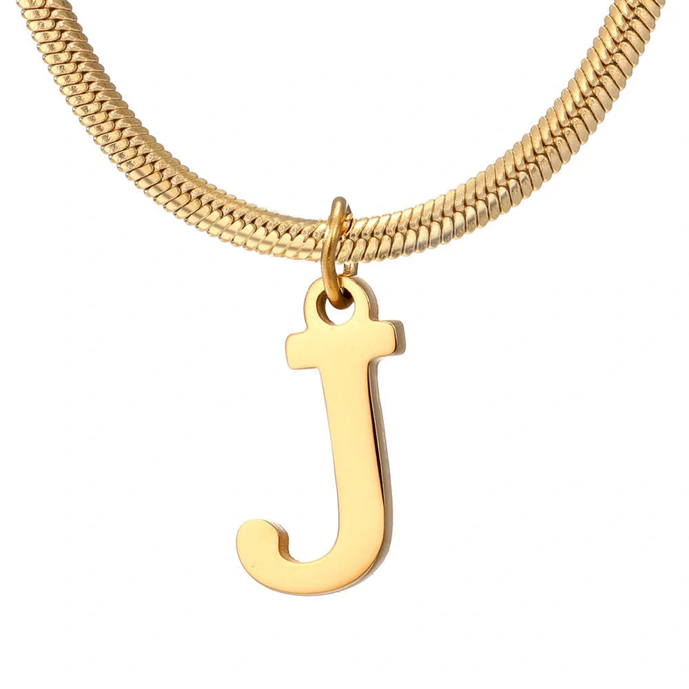 Elegant gold A-Z letter pendant necklace on a snake chain