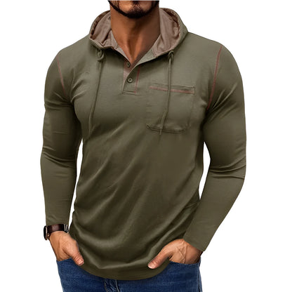 Man wearing a grey hooded henley long-sleeved t-shirt, showcasing the pullover style and cotton blend fabric.
