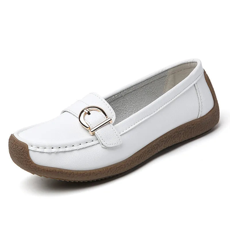 Women's beige casual loafers with a round toe and shallow-cut vamp on a beef tendon sole.