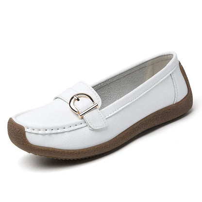 Women's beige casual loafers with a round toe and shallow-cut vamp on a beef tendon sole.