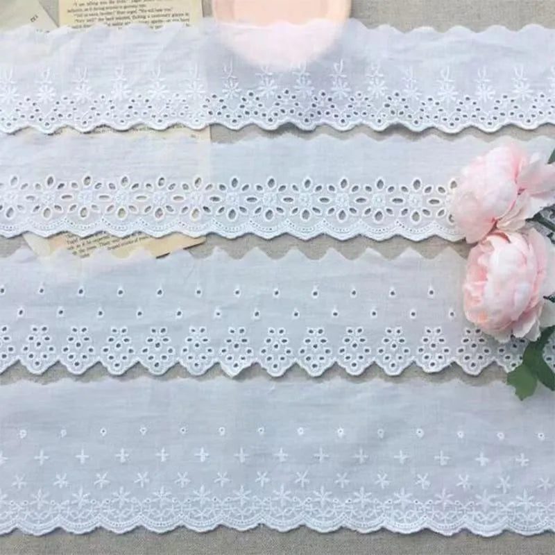 Cotton embroidered lace trim ribbon showing floral cutout patterns in four different width styles