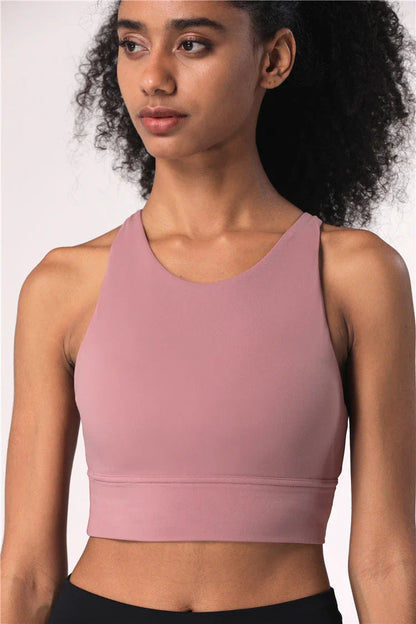 Versatile Fitness Sports Bra with Strappy Design and Customizable Support