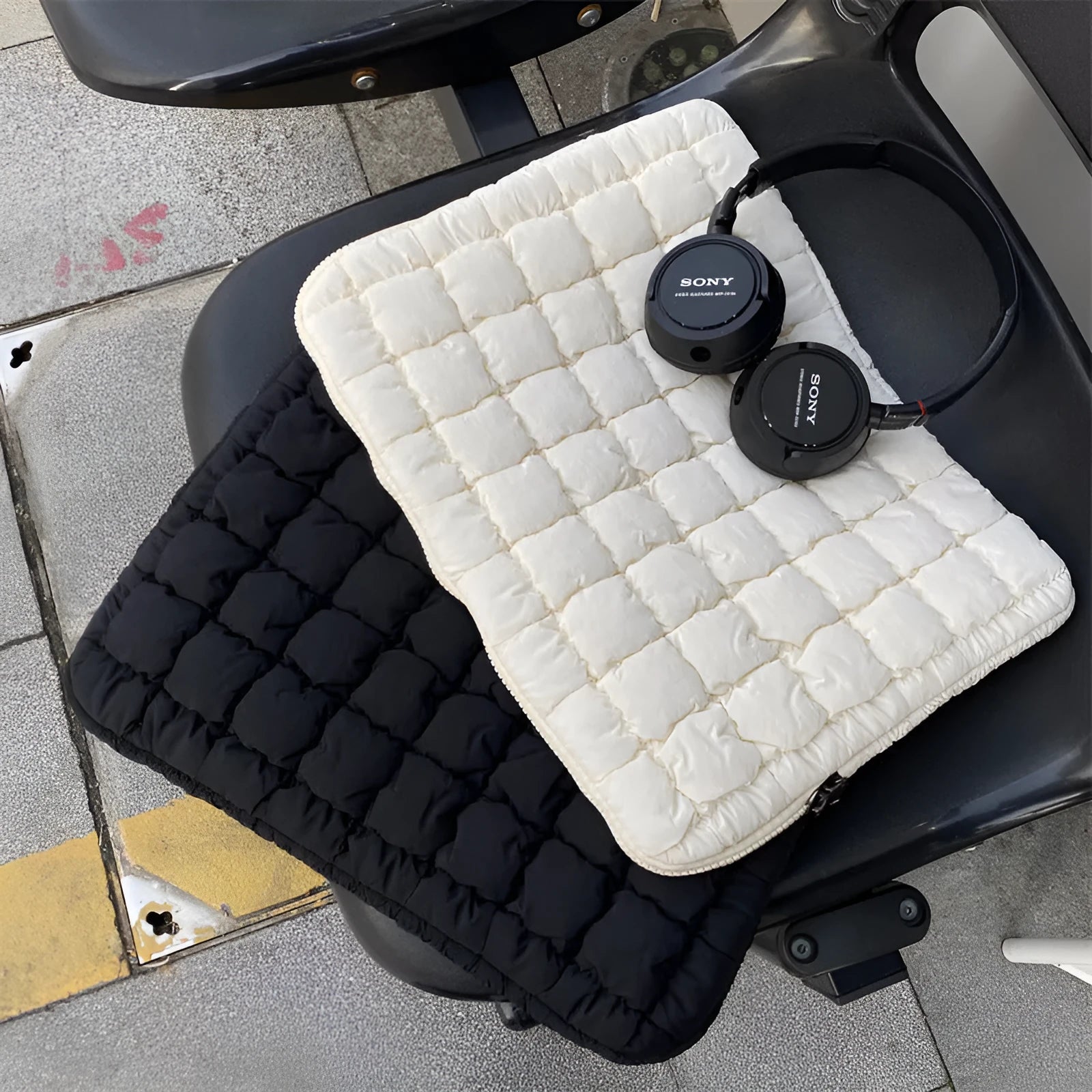 Nylon laptop bag with cloud cotton storage compartments in black or white colour options