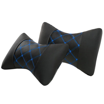 Black leather quilted car headrest with diamond pattern and red stitching lines on cervical support pillow