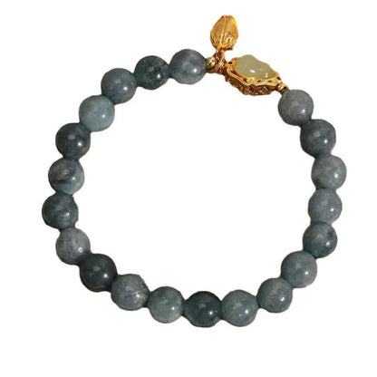 Women's natural stone bracelet with sky blue carved gourd and lotus pendant