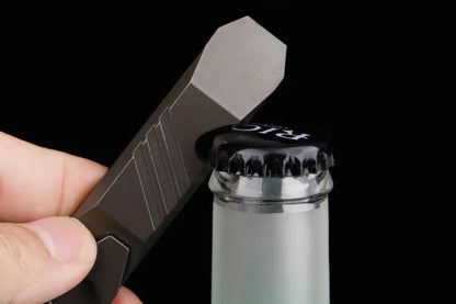 Titanium alloy multi-function crowbar tool with bottle opener on a stone wash finish background.
