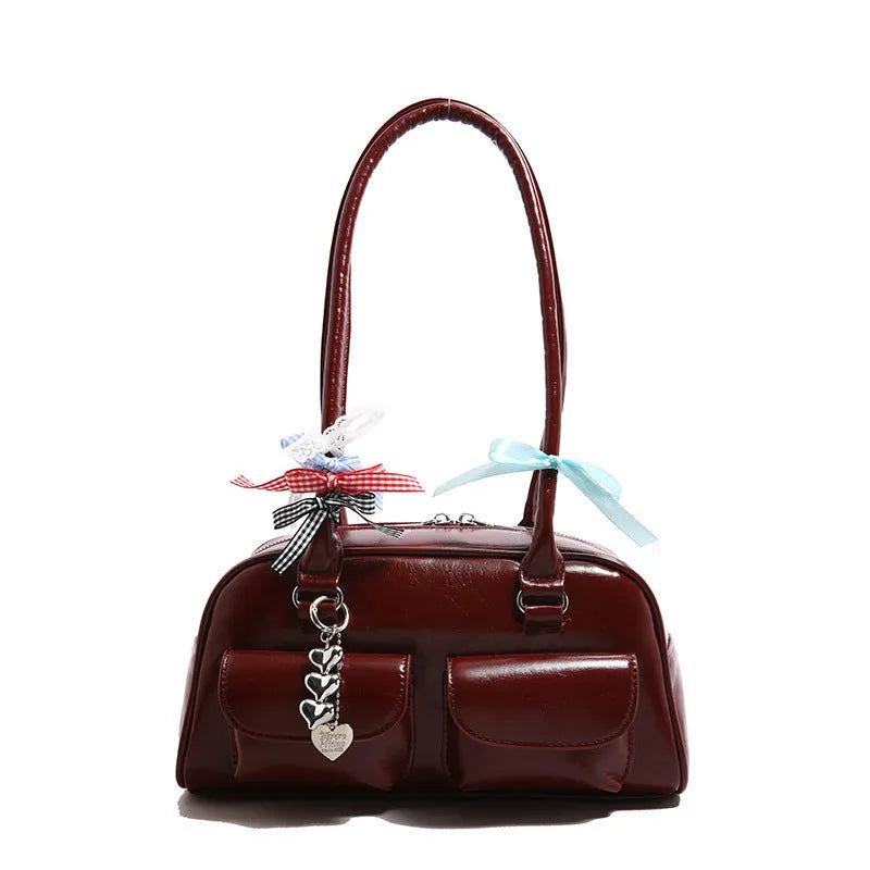 Women's retro pillow-shaped handbag in PU leather with double shoulder straps and flap closure