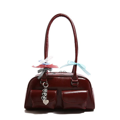 Women's retro pillow-shaped handbag in PU leather with double shoulder straps and flap closure
