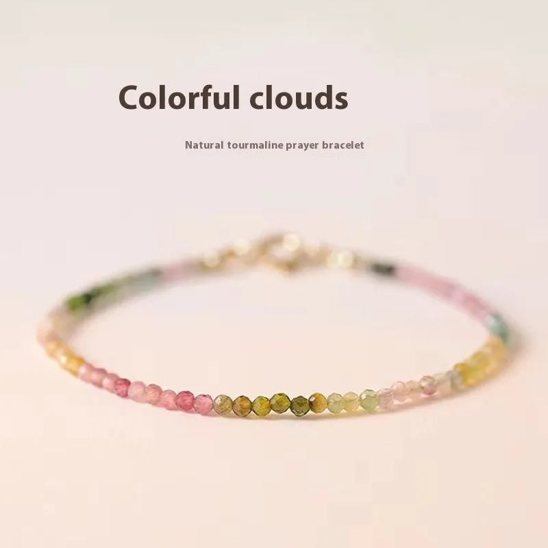 Handmade women's bracelet with rainbow fluorite stone in geometric copper links.