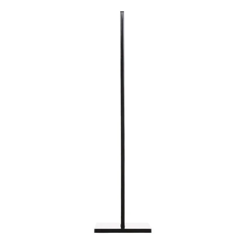Pink and black detachable headset stand with non-slip silicone base on a desk.