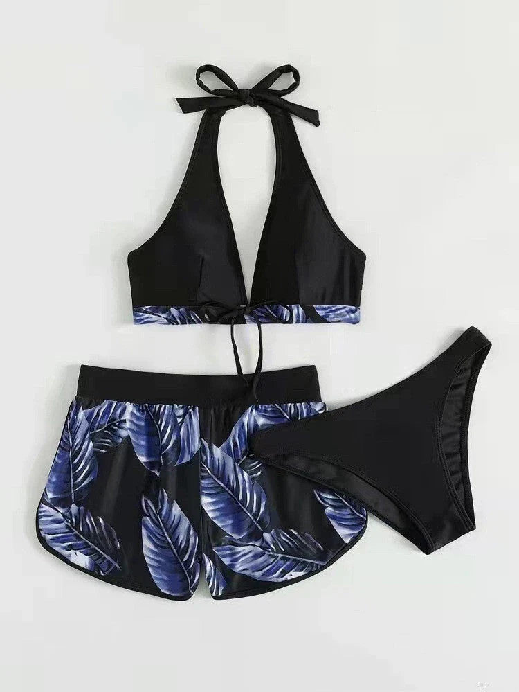 A stylish 3-piece leaf print bikini set with matching shorts, available in a variety of vibrant colors and patterns