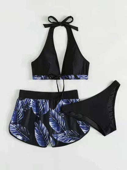 A stylish 3-piece leaf print bikini set with matching shorts, available in a variety of vibrant colors and patterns