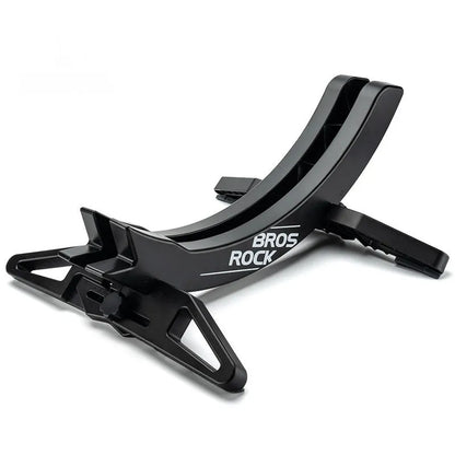 A black wall-mounted ABS plastic bracket holding a mountain bike vertically for storage.