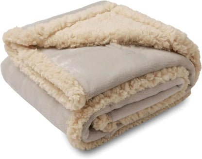 Cozy flannel dog blanket with soft sherpa accents for all-season comfort and warmth