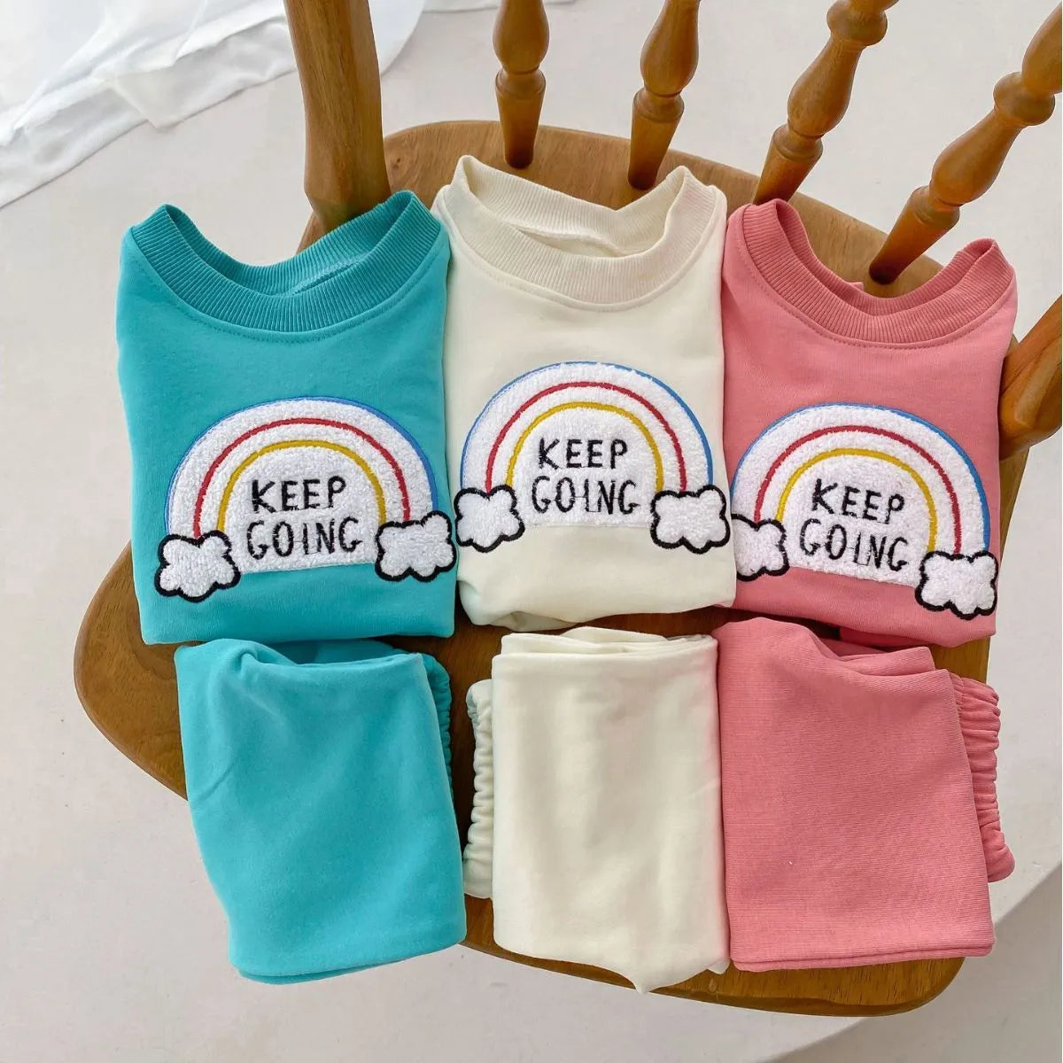Children's cotton two-piece sweater set with pullover top and trousers in beige, emerald, or pink, sizes 66cm to 100cm.