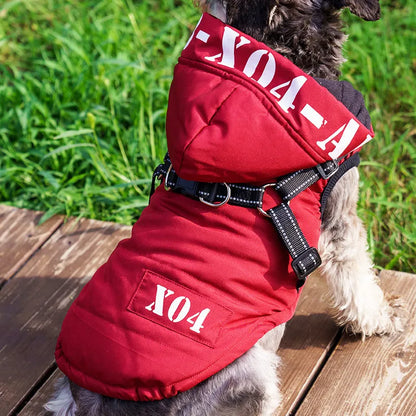 Red fleece-lined waterproof dog winter jacket with hood on a small dog