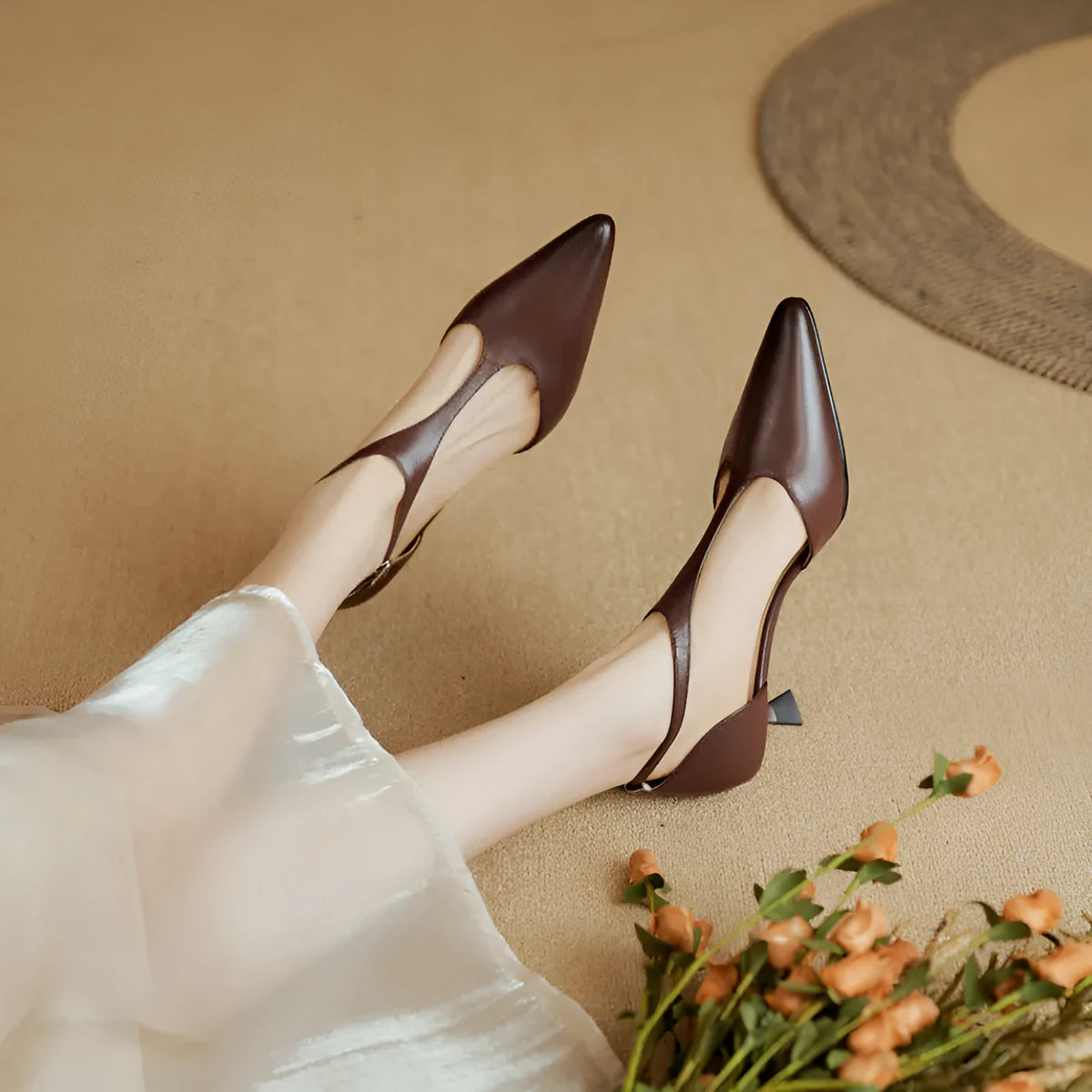 Women's black and brown cowhide leather high heels with pointed toe design
