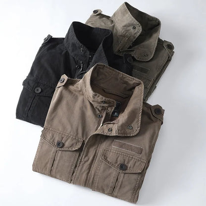 Men's loose-fit cotton zip jacket in light brown colour on a hanger, showing stand collar and front zip.