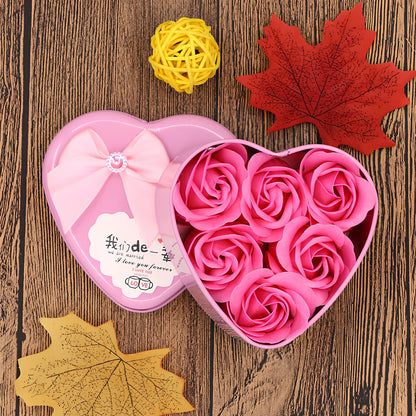 Handmade soap flowers in red heart-shaped tin box measuring 12x12x5cm
