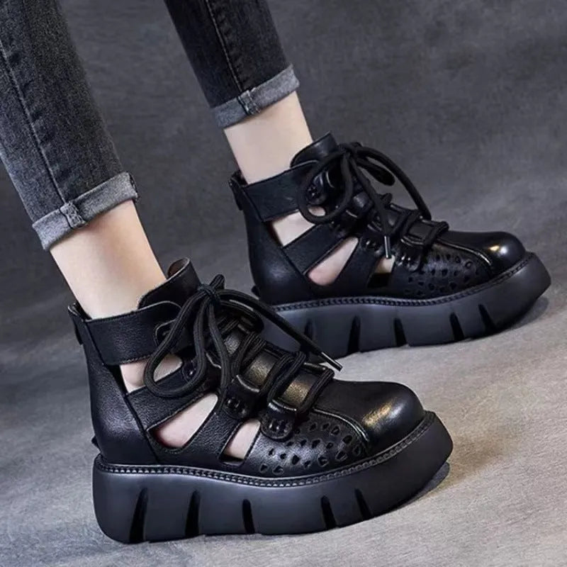 Women's platform sandals with hollow hole design in soft cowhide leather, shown in black colour with sporty styling