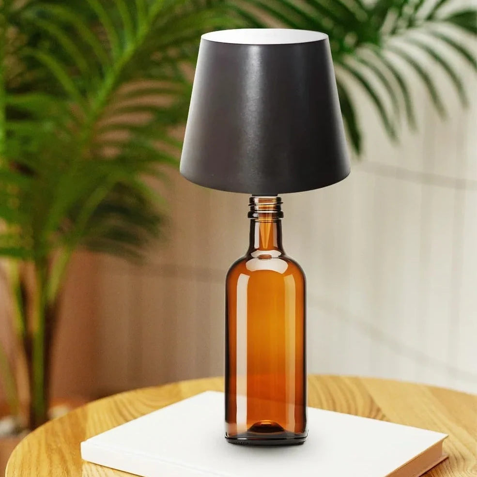White and black LED wine bottle table lamps with USB charging and dimmable lighting on wooden surface