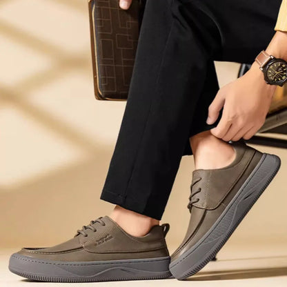 Retro brown leather lace-up casual shoes for men with visible stitching and a rubber sole.