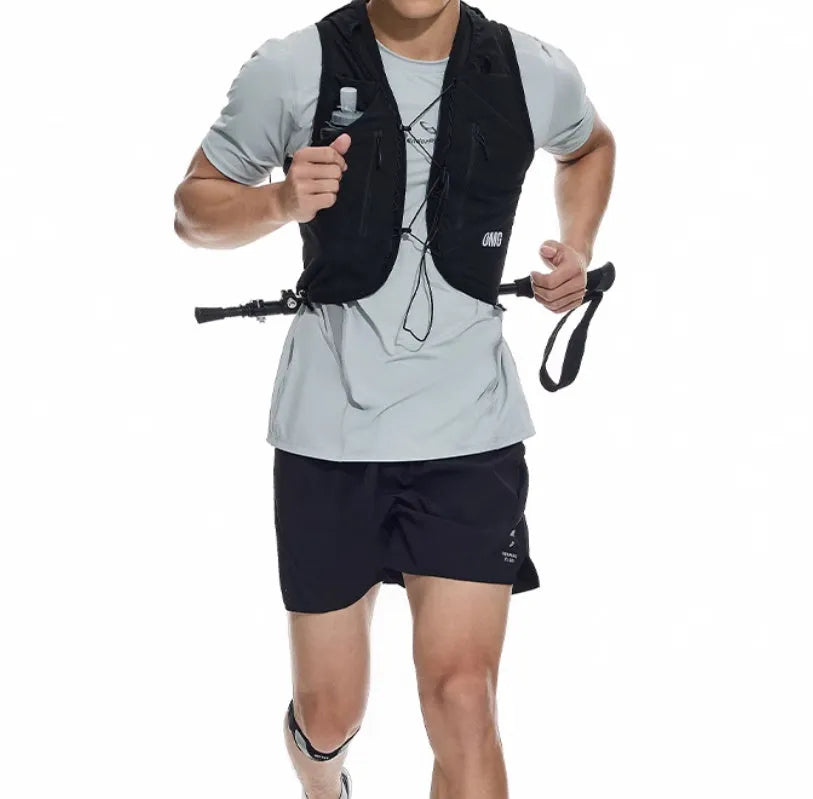 Men's black and blue stretch running shorts with laser punch stitching detail on the legs.