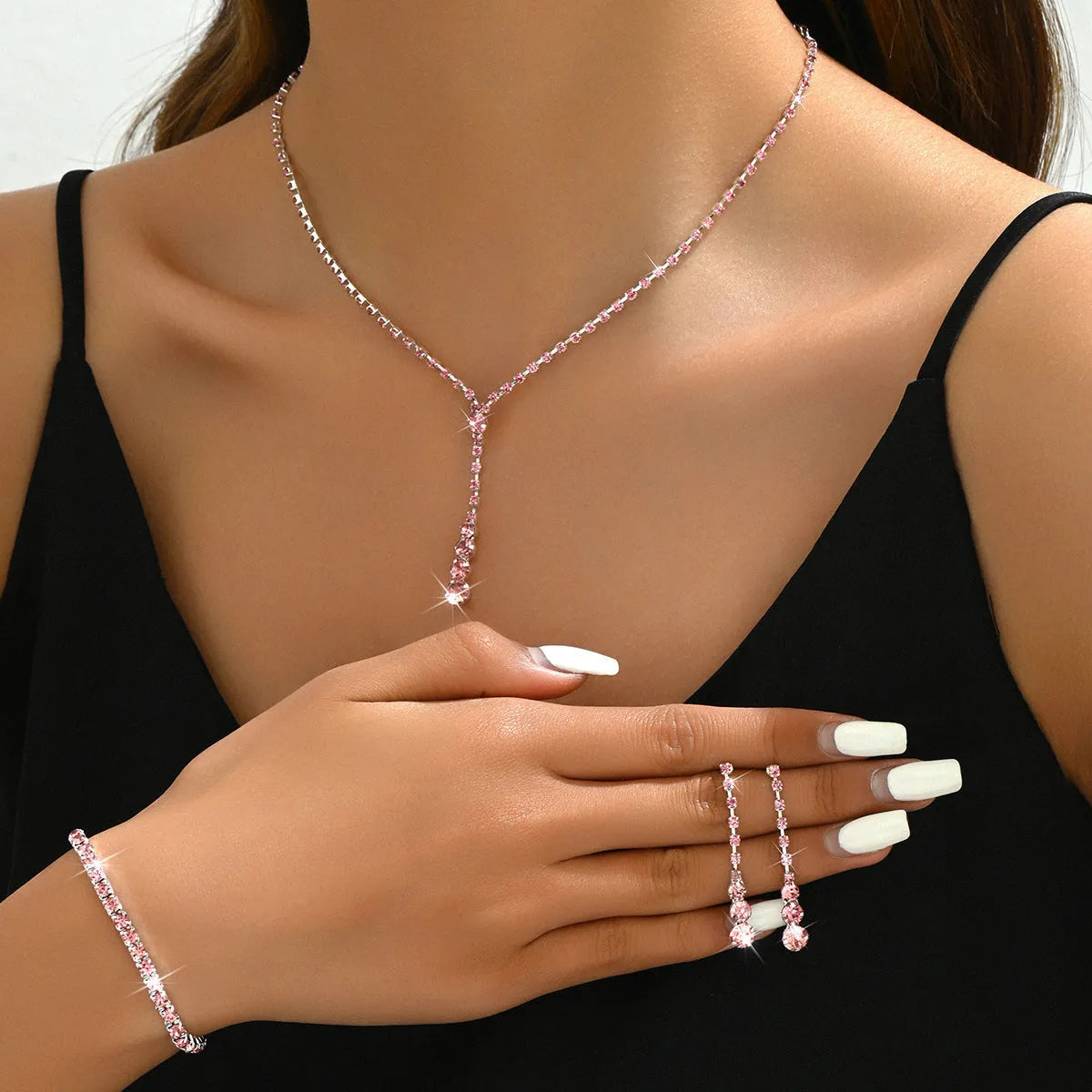 Rhinestone heart pendant jewellery set with necklace, bracelet and earrings in silver pink colour