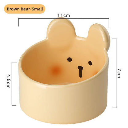 Blush Critter ceramic pet bowls in white rabbit and brown bear designs, showing neck protection rim.