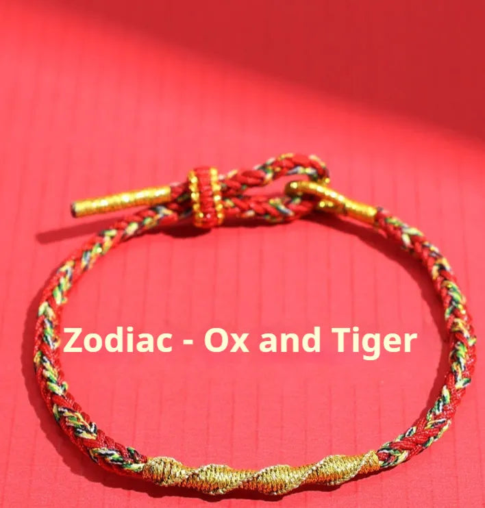 Woven eight-strand hand strap in zodiac-themed colours with flexible wire construction