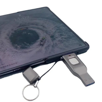 Black fingerprint encrypted USB flash drive showing USB 3.0 and Type-C interfaces on metal casing