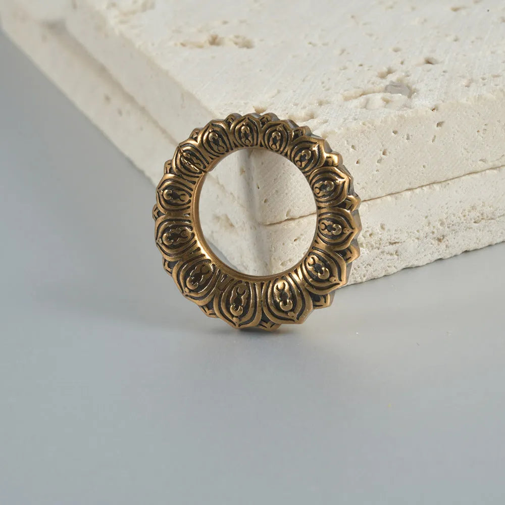 Stainless steel magnetic earrings with hollow heart or lotus design in antique silver or gold finish