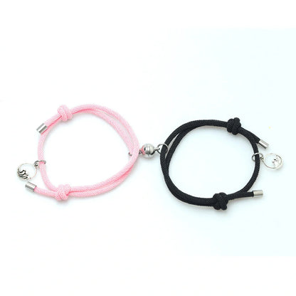 Magnetic couple's bracelet with geometric design and meaningful charms inspired by ancient Chinese tradition