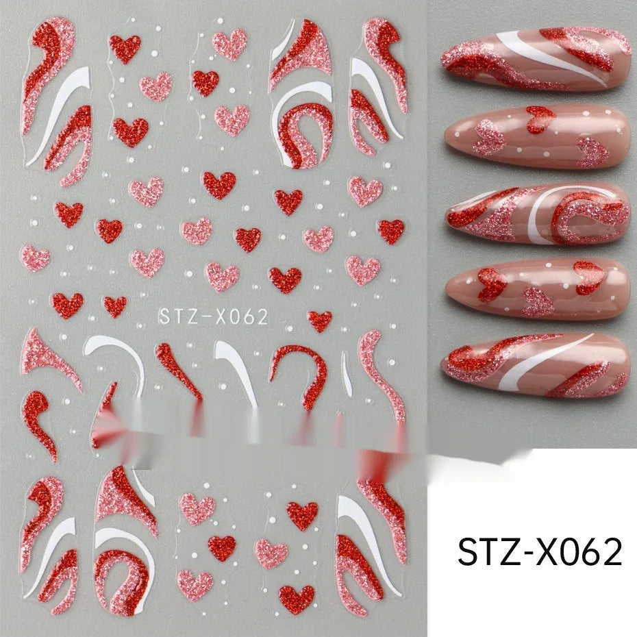 Assortment of black and silver nail sticker designs including cartoon and French tip patterns on a plastic sheet.