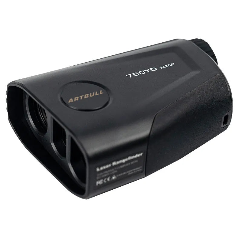 Black golf laser rangefinder with LCD display showing yardage, placed on a green golf towel.