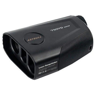 Black golf laser rangefinder with LCD display showing yardage, placed on a green golf towel.