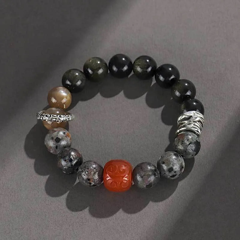 Golden obsidian flame stone red agate unisex bracelet with original design.