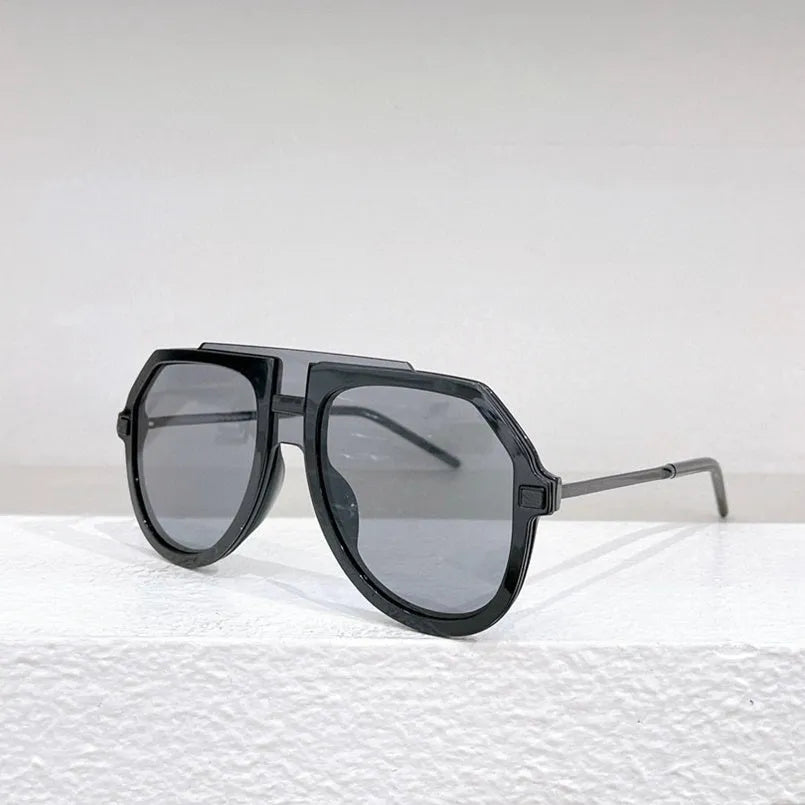 Women's fashion sunglasses with black leopard print pattern on large elliptical frame