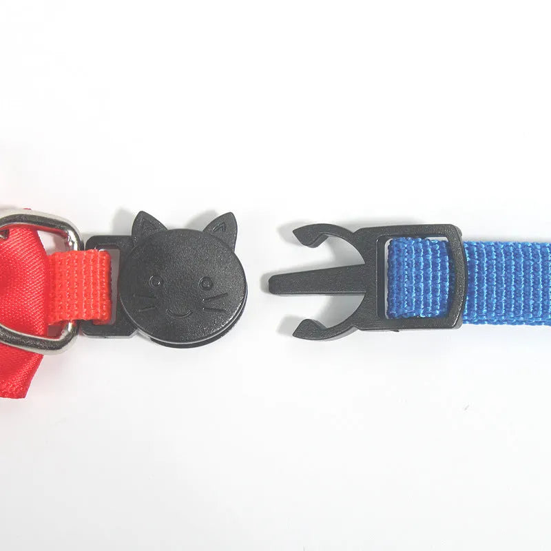 Adjustable nylon cat collar with bell decoration in striped pattern, multiple colour options available