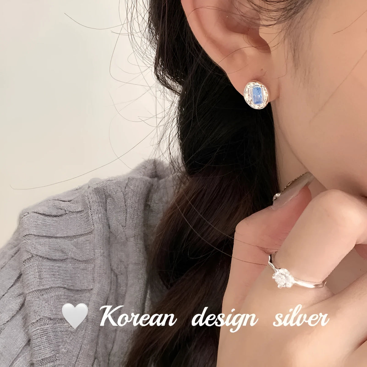 Women's S925 sterling silver oval blue diamond heart-wrapped earrings with electroplated silver finish