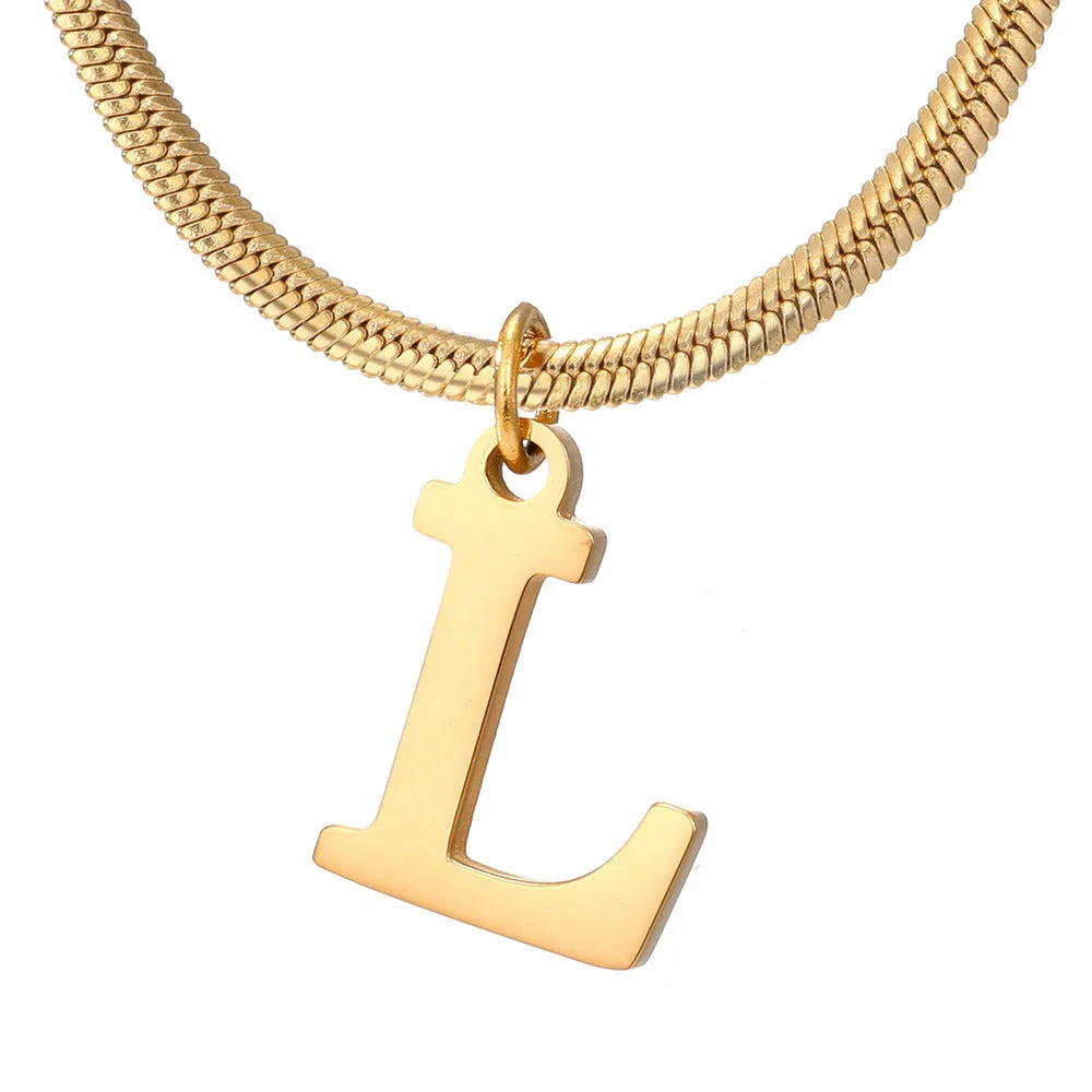 Elegant gold A-Z letter pendant necklace on a snake chain