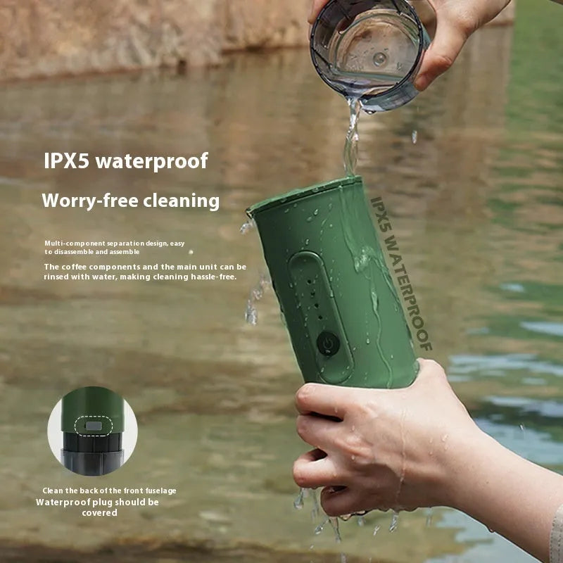 Portable stainless steel coffee machine with car charger power cord in Jungle Green colour.