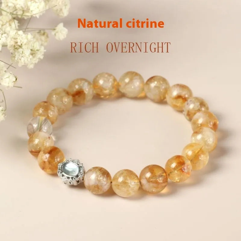 Polished citrine crystal bracelet with 10mm geometric beads on wrist