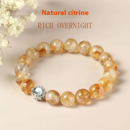 Polished citrine crystal bracelet with 10mm geometric beads on wrist
