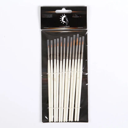 Set of 12 pearl white nylon wool hook line art brushes in a solid wood pen holder.